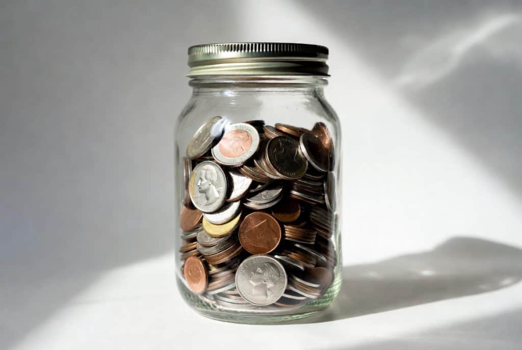 saving money jar emergency fund concept